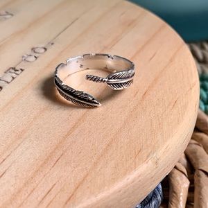 Silver wrap around feather ring